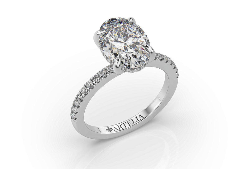 OVAL LAB GROWN DIAMOND ENGAGEMENT RING WITH A HIDDEN HALO AND SIDE DIAMONDS